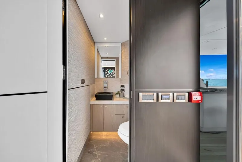 Slide: The Image of Luxurious bathroom interior on 2020 Hargrave C92 yacht with modern fixtures and ocean view. - 55