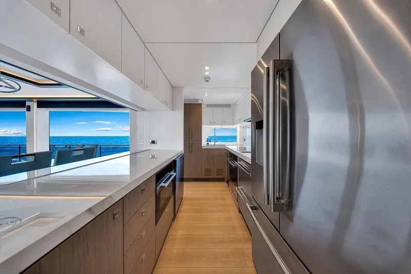 Slide: The Image of Modern kitchen interior on 2020 Hargrave C92 yacht with ocean view. - 71