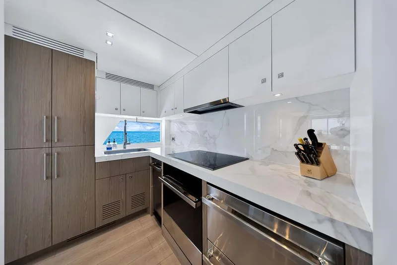 Slide: The Image of Modern kitchen interior on 2020 Hargrave C92 yacht with ocean view. - 73