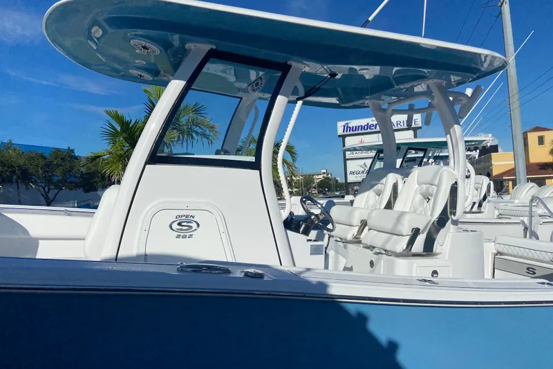 Slide: The Image of 2026 Sportsman Open 282 Center Console boat with sleek design and modern features. - 1