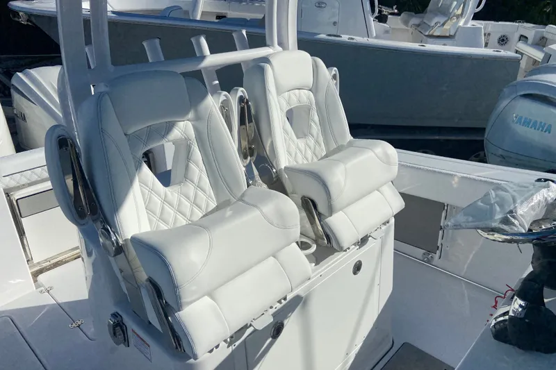 Slide: The Image of 2026 Sportsman Open 282 Center Console with luxurious white seating and modern design. - 9