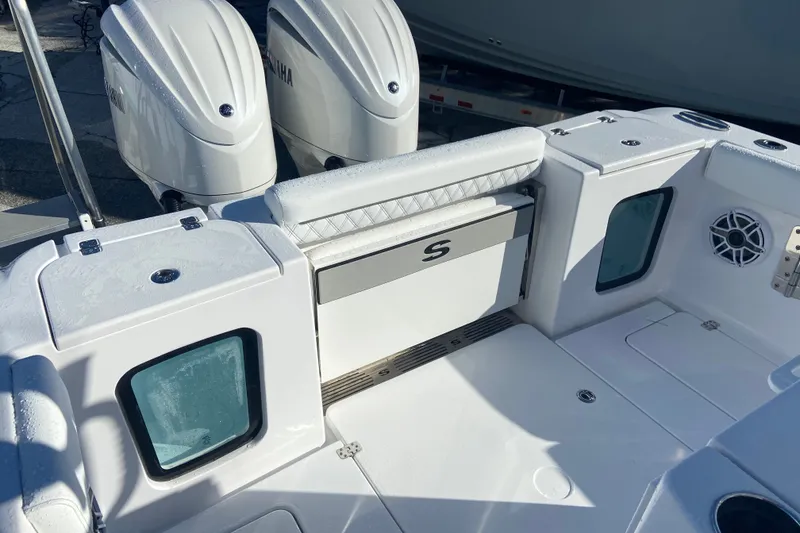 Slide: The Image of 2026 Sportsman Open 282 Center Console boat with dual Yamaha engines. - 4