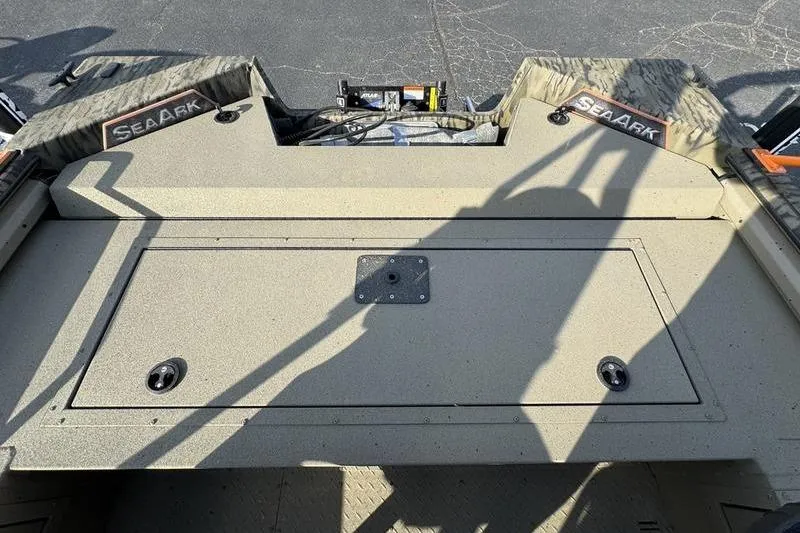 Slide: The Image of 2026 SeaArk EasyCat boat deck with storage compartment and SeaArk branding. - 15