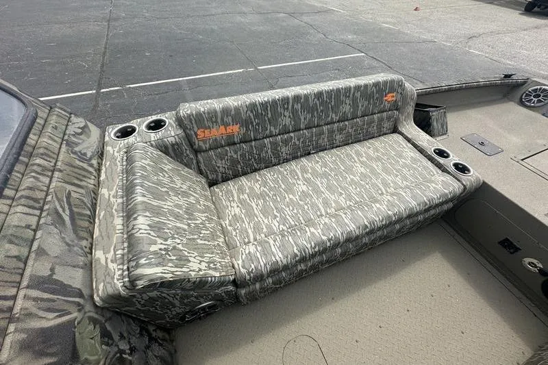 Slide: The Image of Camouflage seating on 2026 SeaArk EasyCat boat with cup holders. - 4
