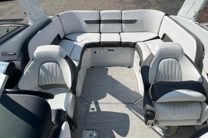 Slide: The Image of Luxurious seating in 2026 Crownline 270 SS boat, featuring sleek white and black upholstery. - 14