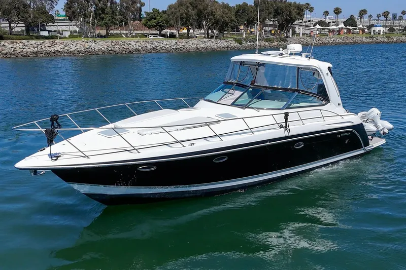 The Image of 2005 Formula 40 Performance Cruiser on calm water, showcasing sleek design and luxury features. - 1