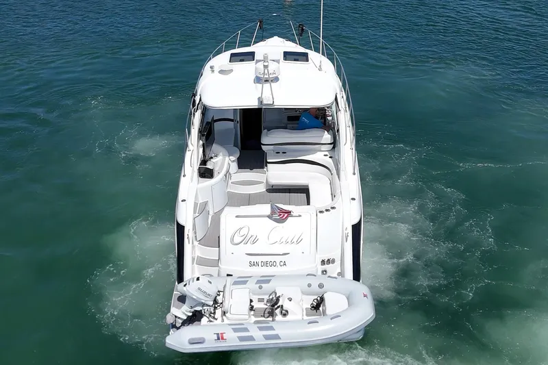 Slide: The Image of 2005 Formula 40 Performance Cruiser navigating ocean waters near San Diego. - 13