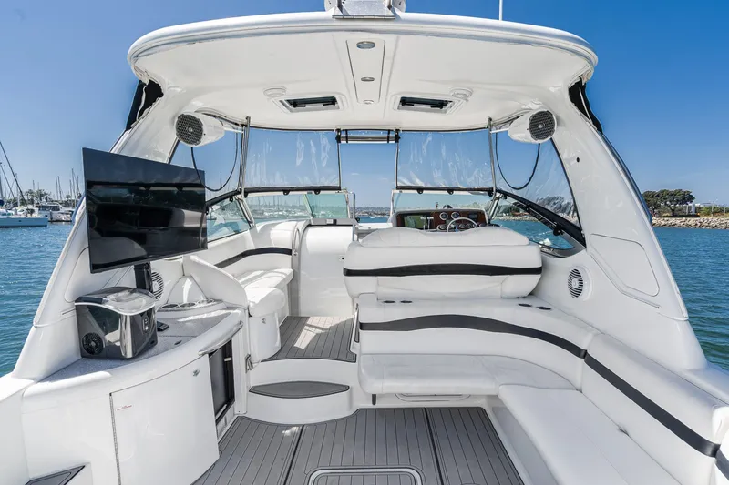 Slide: The Image of Luxurious 2005 Formula 40 Performance Cruiser interior with seating and entertainment system. - 17
