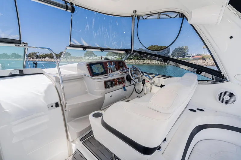 Slide: The Image of 2005 Formula 40 Performance Cruiser cockpit with modern navigation equipment and luxurious seating. - 22