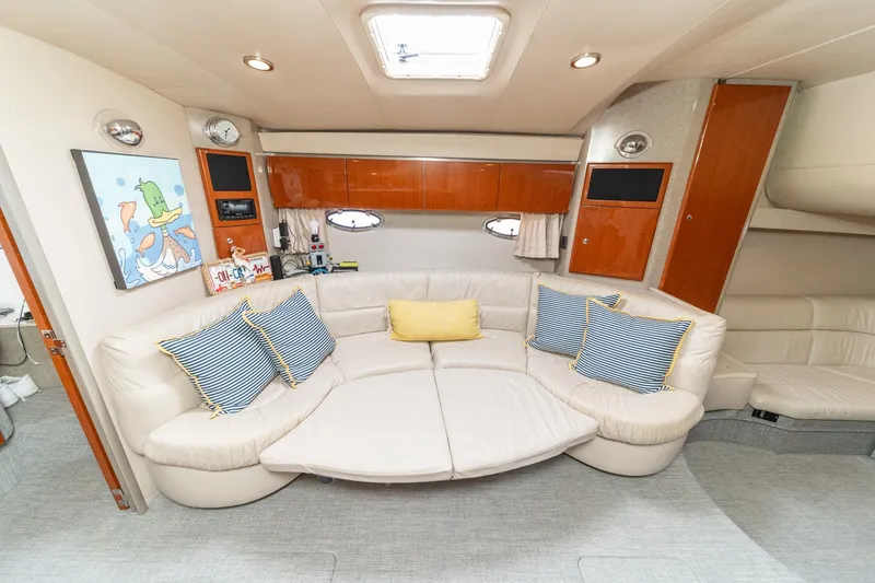 Slide: The Image of Luxurious interior of a 2005 Formula 40 Performance Cruiser with plush seating and nautical decor. - 33