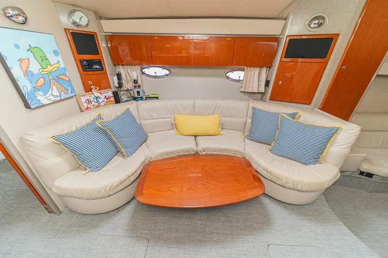Slide: The Image of Luxurious interior of a 2005 Formula 40 Performance Cruiser with plush seating and nautical decor. - 34