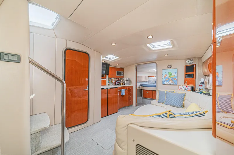 Slide: The Image of Interior of 2005 Formula 40 Performance Cruiser with modern furnishings and cozy seating area. - 35