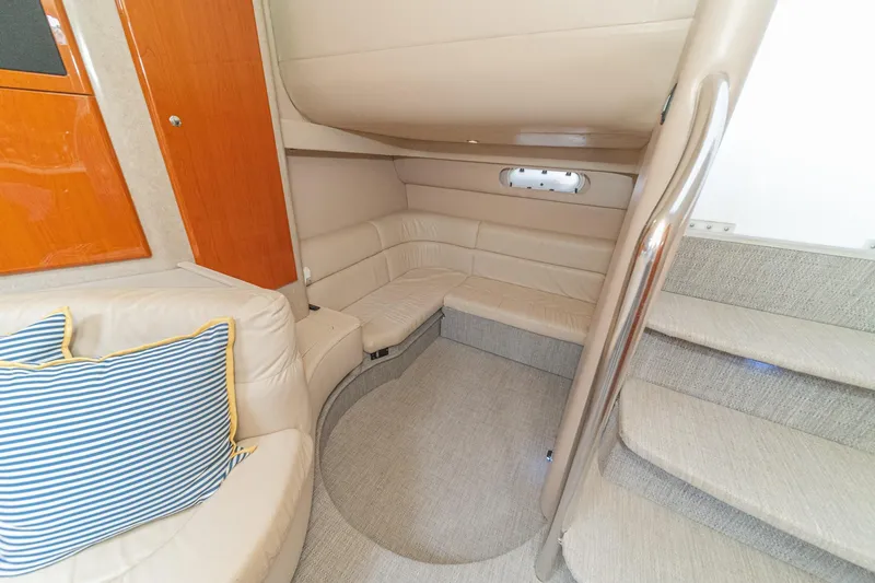 Slide: The Image of Interior of 2005 Formula 40 Performance Cruiser with beige seating and wooden accents. - 36
