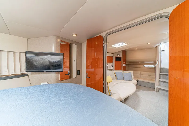 Slide: The Image of Interior of 2005 Formula 40 Performance Cruiser with modern furnishings and cozy seating area. - 40