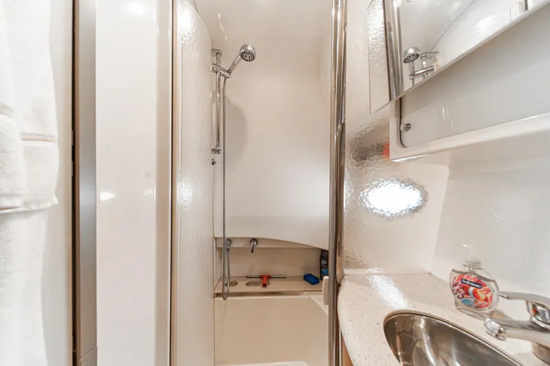 Slide: The Image of Bathroom interior of 2005 Formula 40 Performance Cruiser with shower and sink. - 42