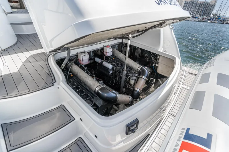 Slide: The Image of Engine compartment of a 2005 Formula 40 Performance Cruiser yacht at a marina. - 43