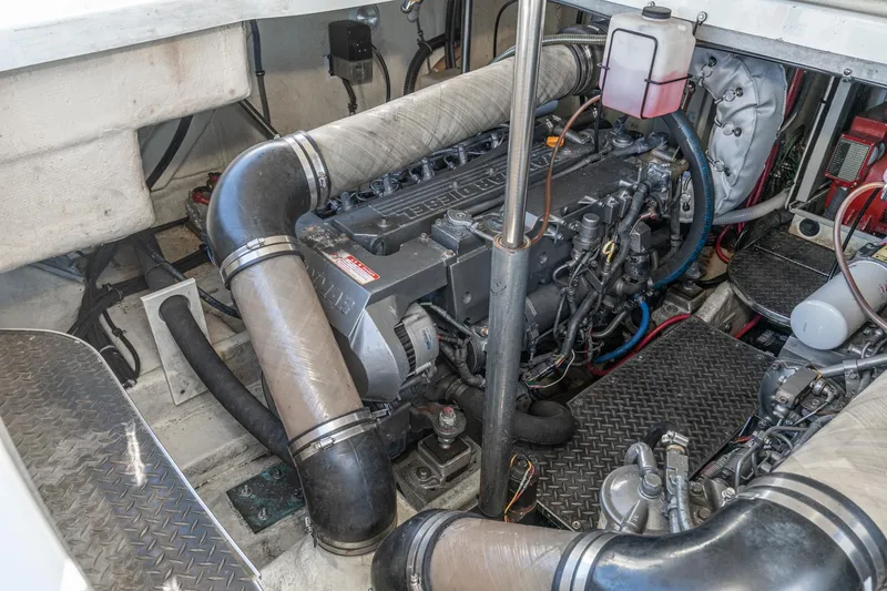 Slide: The Image of Engine compartment of a 2005 Formula 40 Performance Cruiser, showcasing detailed mechanical components. - 45