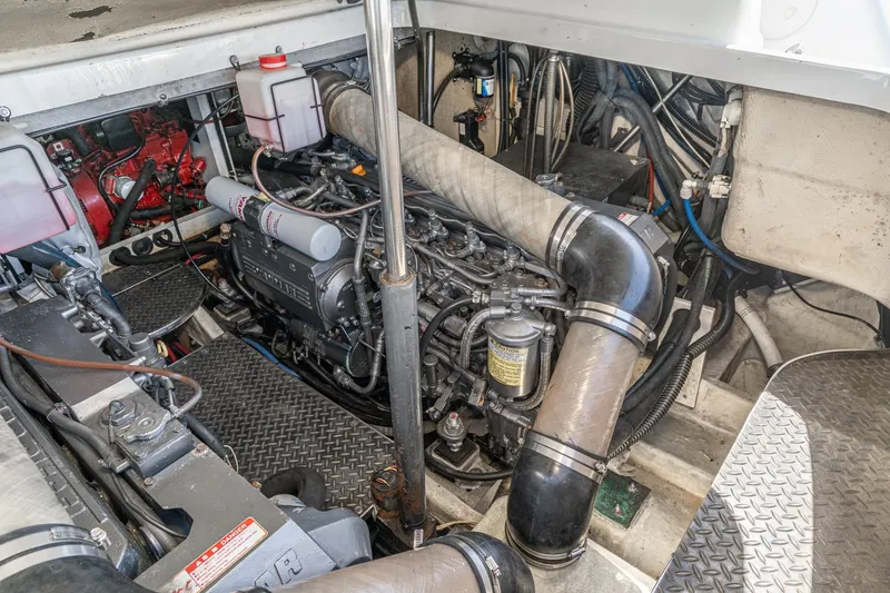 Slide: The Image of Engine compartment of a 2005 Formula 40 Performance Cruiser, showcasing detailed mechanical components. - 46