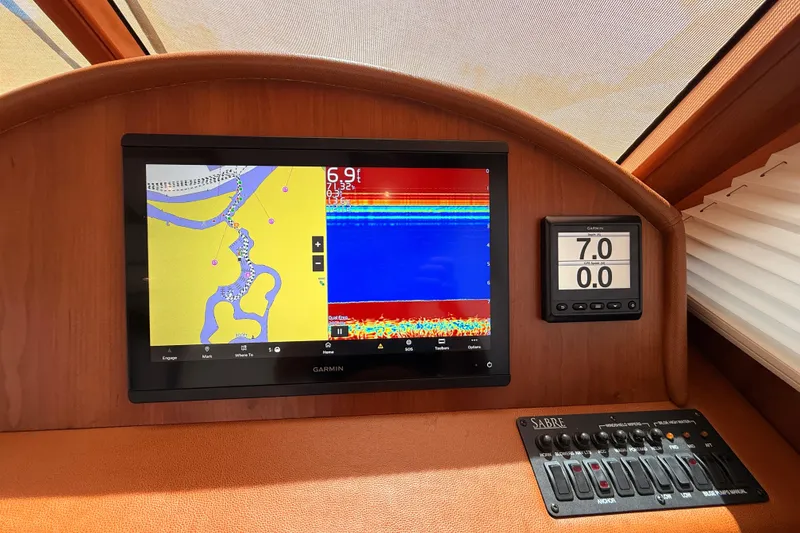 Slide: The Image of Garmin navigation display on 2022 Sabre 38 Salon Express yacht dashboard. - 26