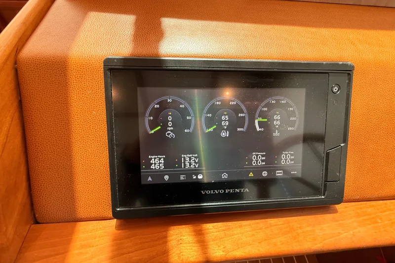 Slide: The Image of Volvo Penta display on 2022 Sabre 38 Salon Express, showing engine metrics and gauges. - 27