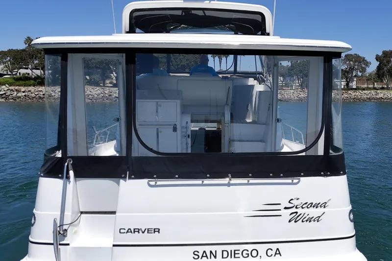 Slide: The Image of 2002 Carver 396 Motor Yacht named "Second Wind" docked in San Diego. - 13
