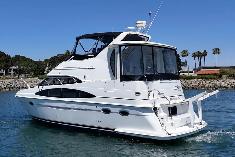 Slide: The Image of 2002 Carver 396 Motor Yacht cruising in sunny San Diego waters. - 4