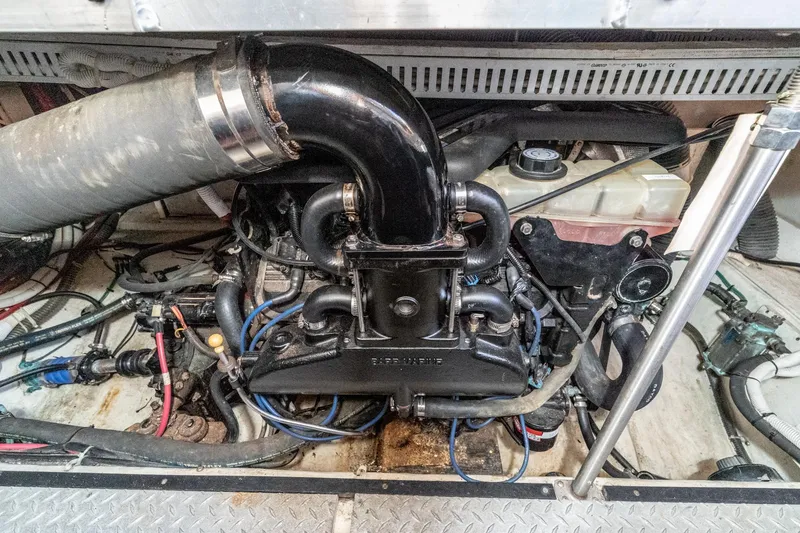 Slide: The Image of Engine compartment of a 2002 Carver 396 Motor Yacht, showcasing mechanical components. - 40