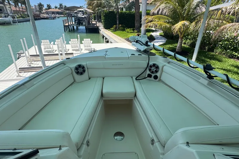 Slide: The Image of 2022 Grady-White Freedom 285 boat on clear blue water under a sunny sky. - 21