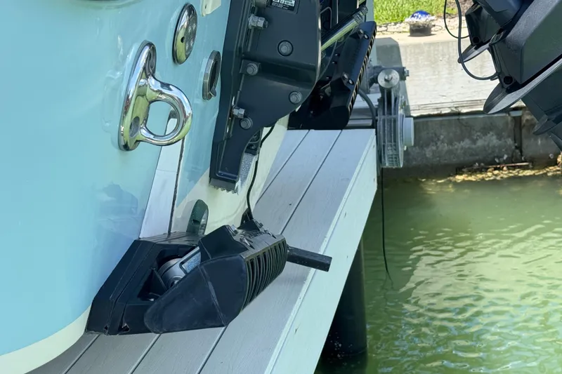 Slide: The Image of 2022 Grady-White Freedom 285 boat interior with seating and clear blue sky. - 25