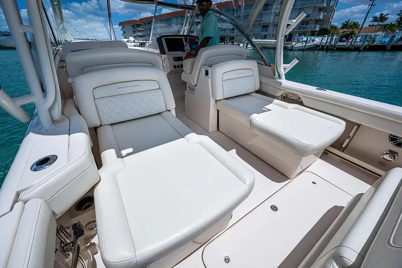 Slide: The Image of 2022 Grady-White Freedom 285 boat interior with luxurious seating and modern design. - 27