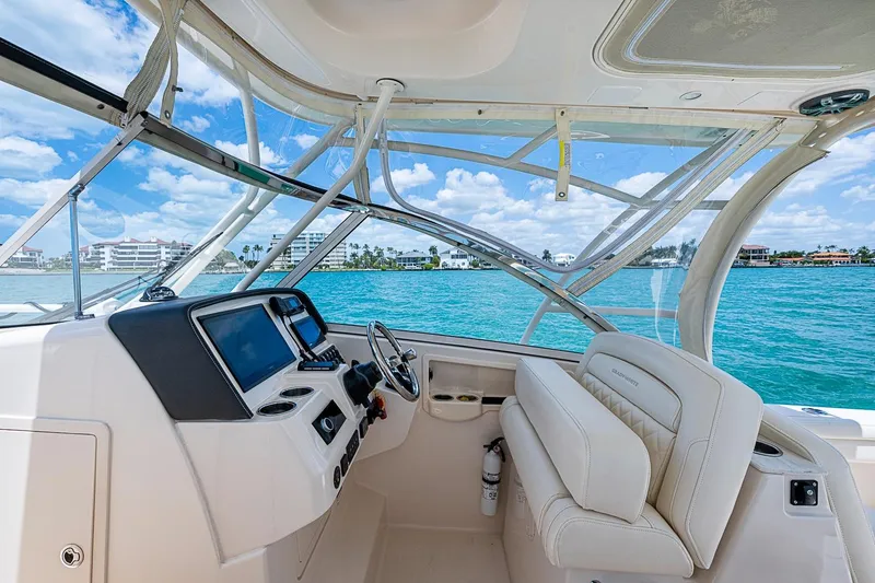 Slide: The Image of Interior view of 2022 Grady-White Freedom 285 boat with ocean backdrop. - 34