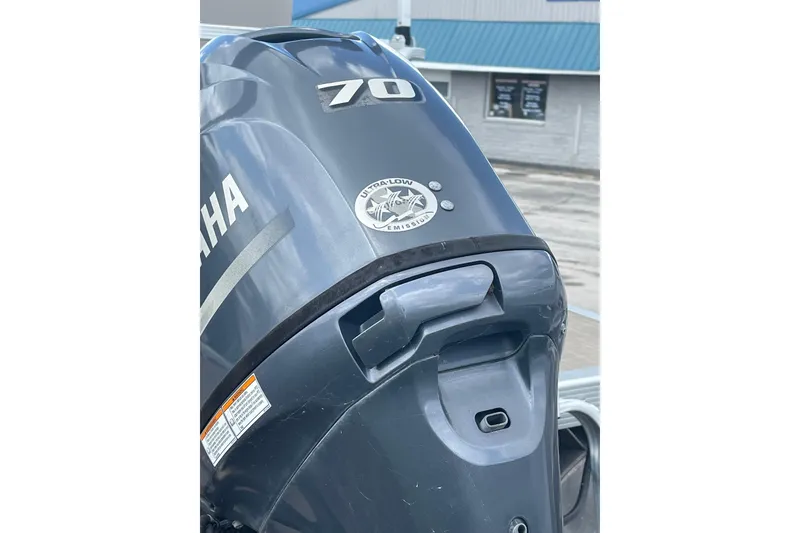 Slide: The Image of Yamaha 70 horsepower outboard motor on a 2015 Bennington S20 boat. - 9