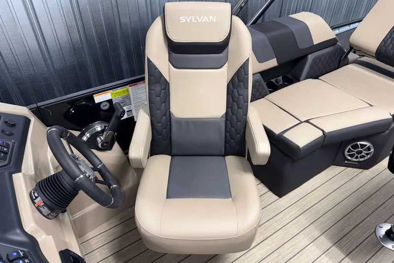 Slide: The Image of Luxurious interior of 2026 Sylvan L1 LZ boat with plush seating and modern controls. - 11