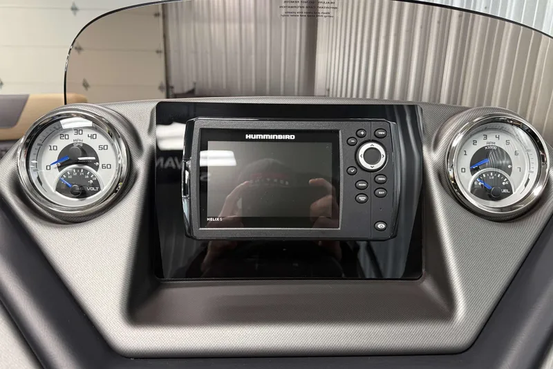 Slide: The Image of Dashboard of 2026 Sylvan L1 LZ with Humminbird Helix 5 GPS and gauges. - 13