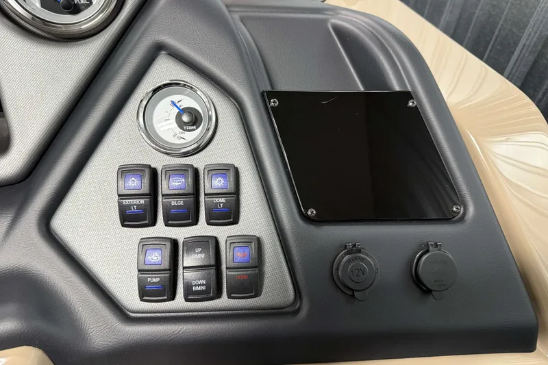 Slide: The Image of Control panel of 2026 Sylvan L1 LZ boat with switches and gauges. - 16