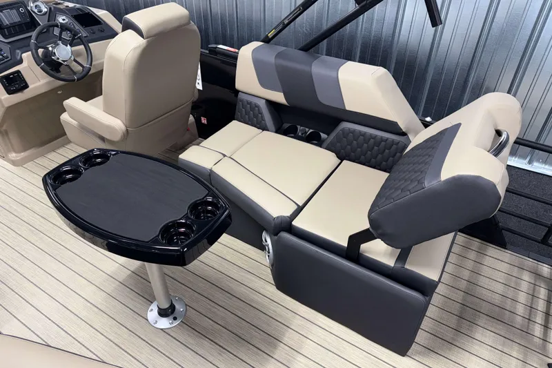 Slide: The Image of Luxurious interior of 2026 Sylvan L1 LZ boat with plush seating and sleek table design. - 4