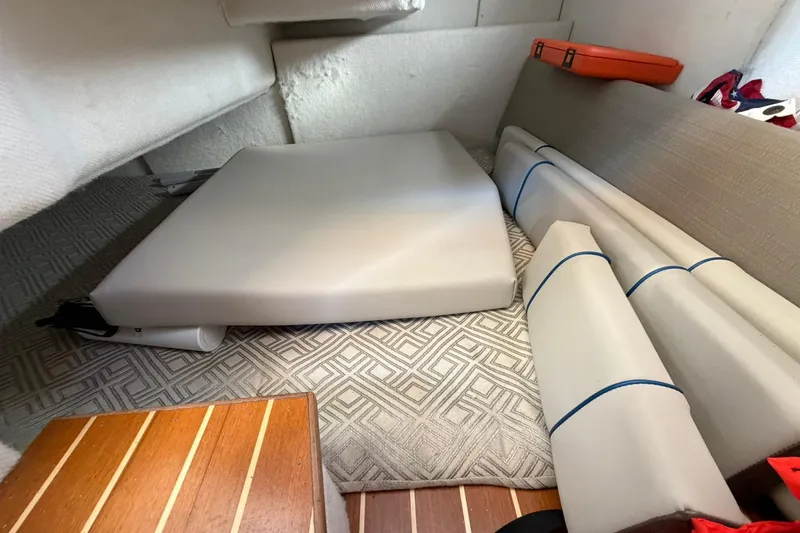 Slide: The Image of Interior cabin of 2019 Cutwater C-28 boat with cushions and storage. - 8