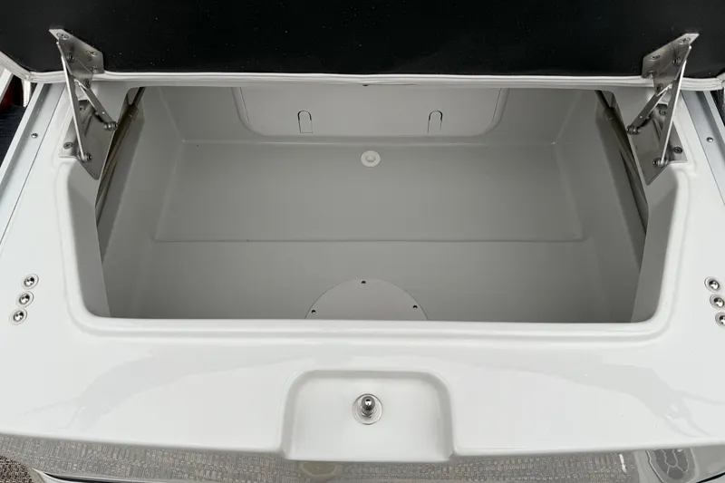 Slide: The Image of Open storage compartment of 2024 Crownline Eclipse E240 XS boat. - 4