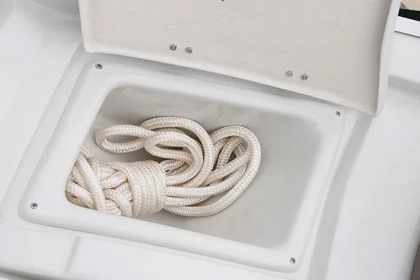 Slide: The Image of Storage compartment with rope on 2024 Crownline Eclipse E240 XS boat. - 9