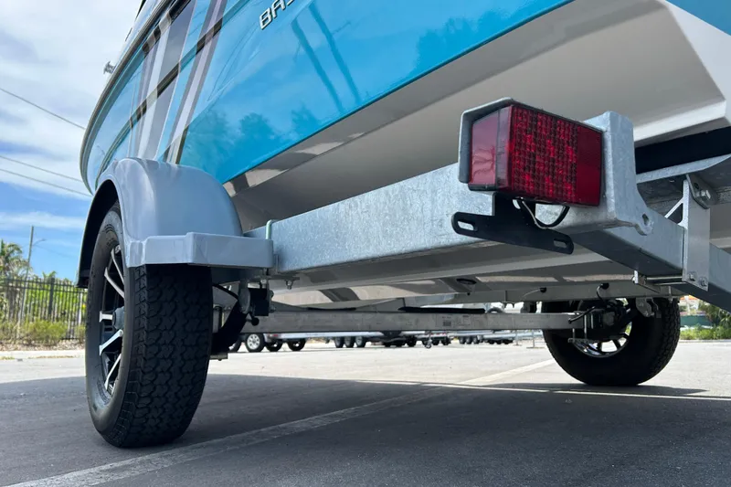 Slide: The Image of 2023 Bayliner VR4 Bowrider OB on trailer, showcasing rear view and trailer details. - 17