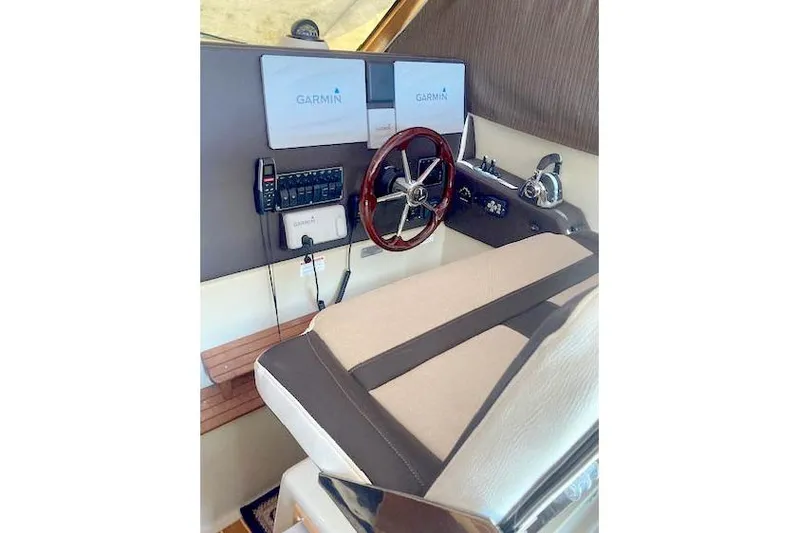 Slide: The Image of 2018 Cutwater C-30 Sedan helm with Garmin navigation and plush seating. - 14