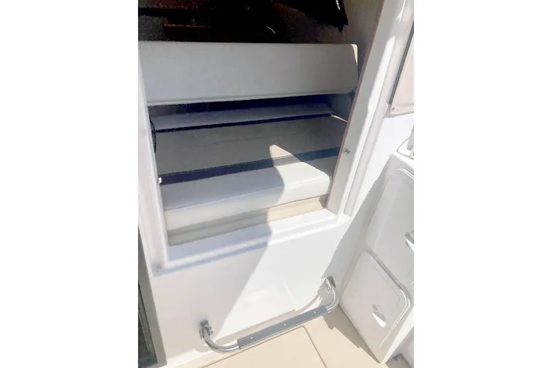 Slide: The Image of Interior view of 2018 Cutwater C-30 Sedan boat cabin entrance. - 24
