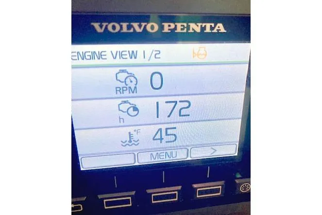 Slide: The Image of Volvo Penta engine display showing RPM, hours, and temperature on a 2018 Cutwater C-30 Sedan. - 28