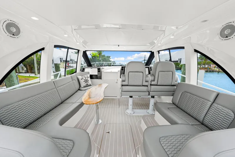Slide: The Image of Luxurious interior of 2019 Intrepid 410 Evolution yacht with elegant seating and scenic views. - 38