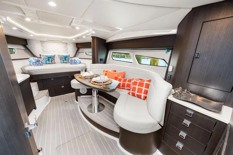 Slide: The Image of Luxurious interior of 2019 Intrepid 410 Evolution yacht with modern seating and decor. - 50