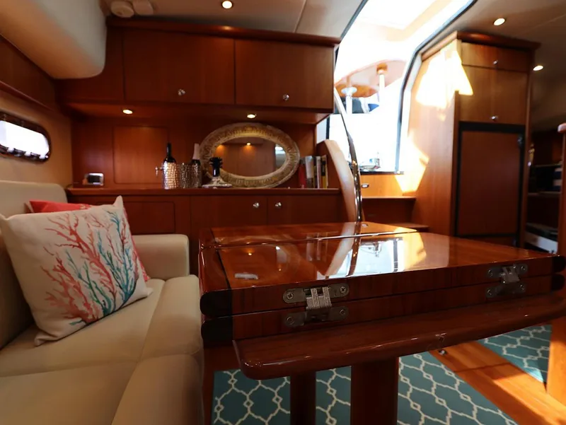 Slide: The Image of Luxurious interior of 2009 Tiara Yachts 4300 Sovran with elegant wood finishes. - 7
