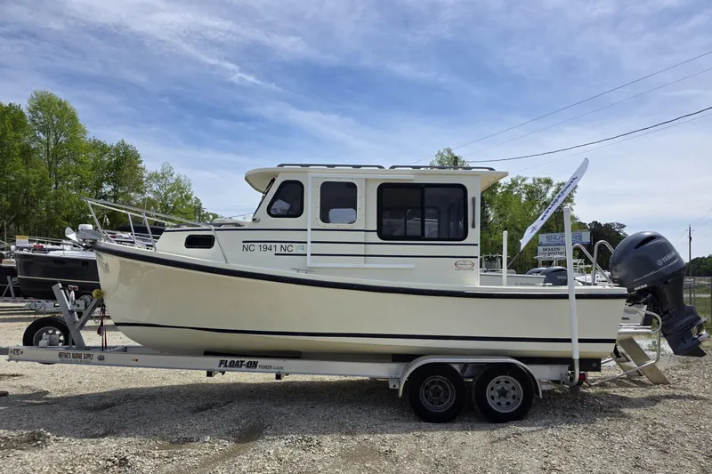 The Image of 2018 Rosborough 22 Cape Breton boat on trailer, parked outdoors. - 0
