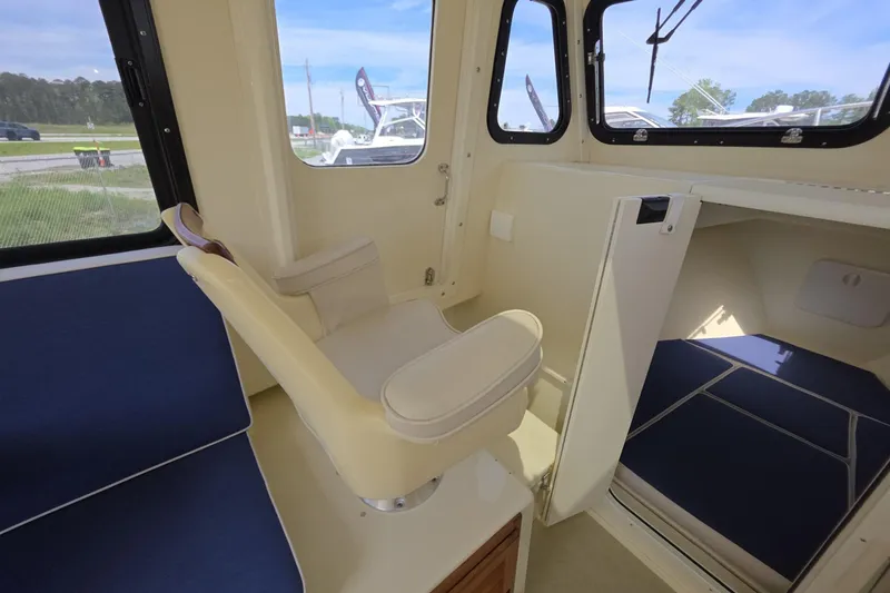 Slide: The Image of Interior of 2018 Rosborough 22 CAPE BRETON boat with seating and cabin area. - 17