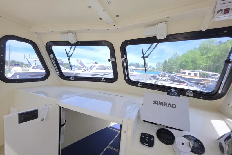 Slide: The Image of Interior view of 2018 Rosborough 22 Cape Breton boat with Simrad navigation system. - 19
