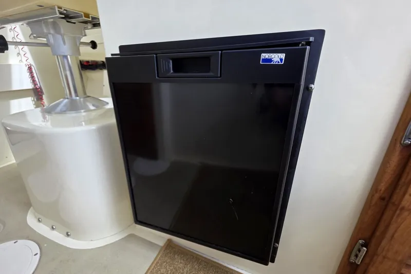 Slide: The Image of 2018 Rosborough 22 Cape Breton boat interior with Norcold refrigerator. - 26